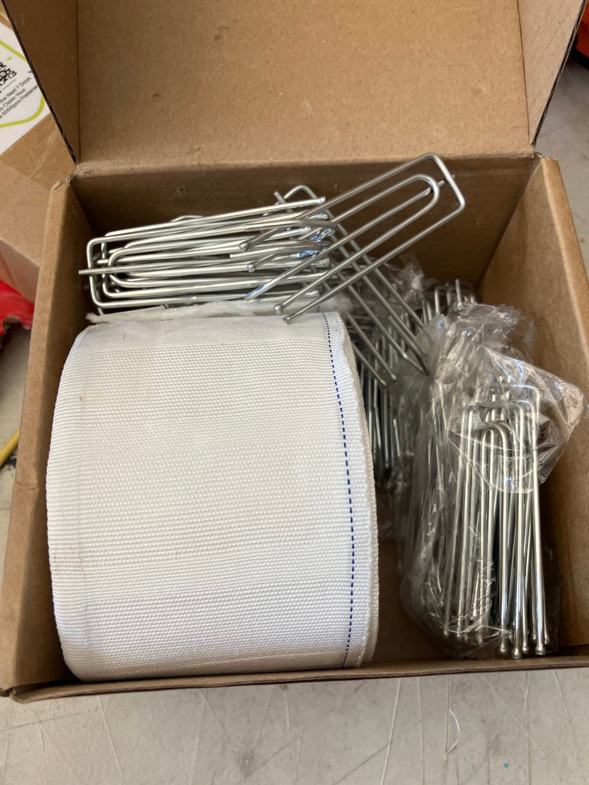 Heavy-Duty Tent Stakes and Fabric Roll for Outdoor Use